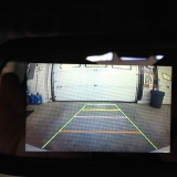 Reverse camera monitor view in rear view mirror